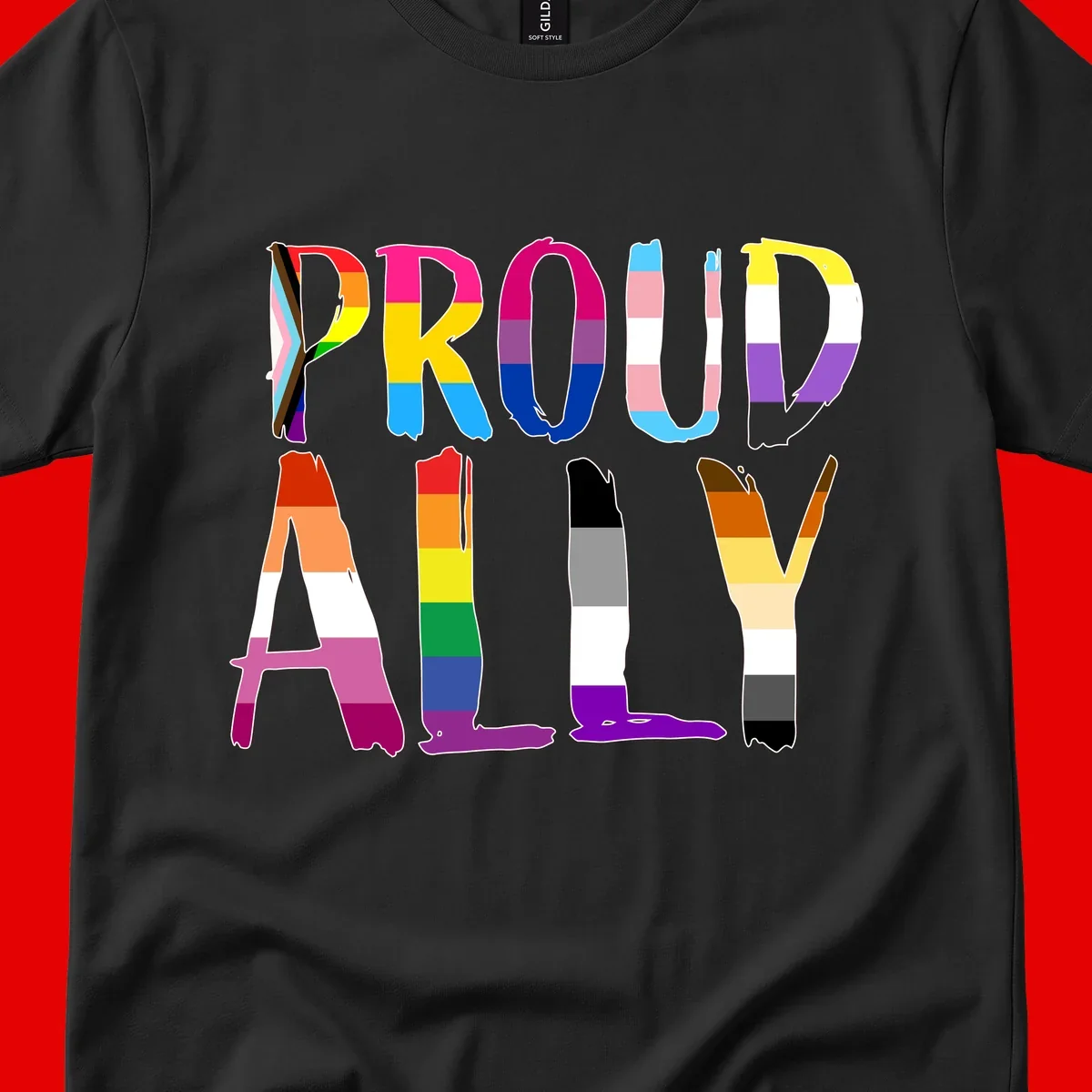 Colorful block letters spelling PROUD filled with rainbow pride flag stripes and patterns including trans and progress pride designs