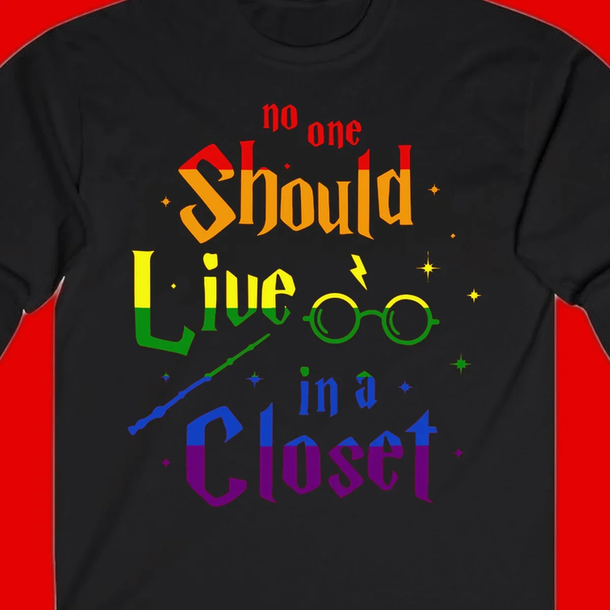 Rainbow gradient text reading 'no one Should live in a Closet' with magical elements including glasses, wand, and stars on gray background