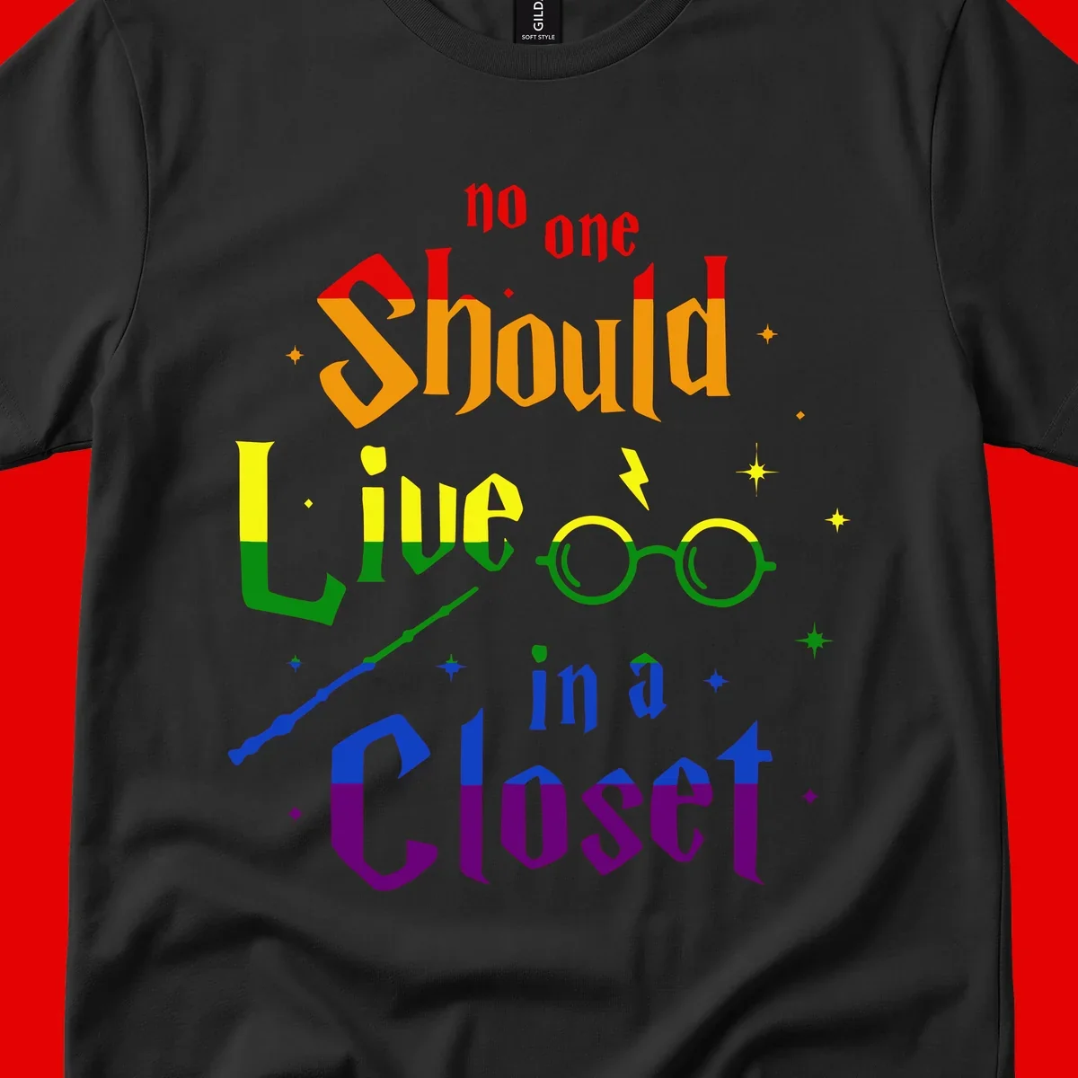 Rainbow gradient text reading 'no one Should live in a Closet' with magical elements including glasses, wand, and stars on gray background