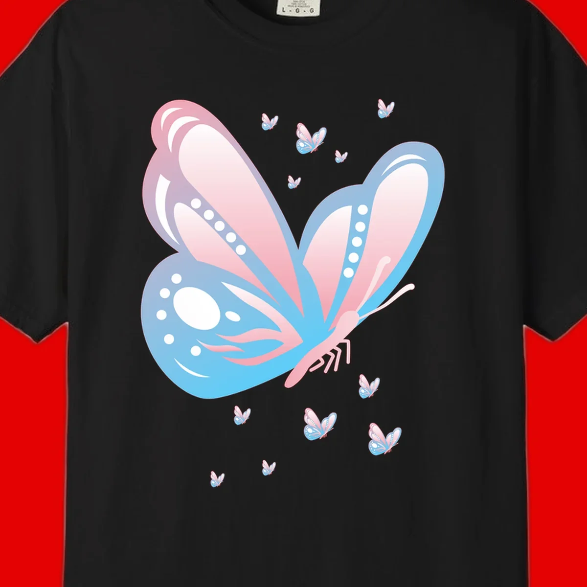 Large butterfly with pink and blue gradient wings featuring white dot details, surrounded by smaller flying butterflies on gray background