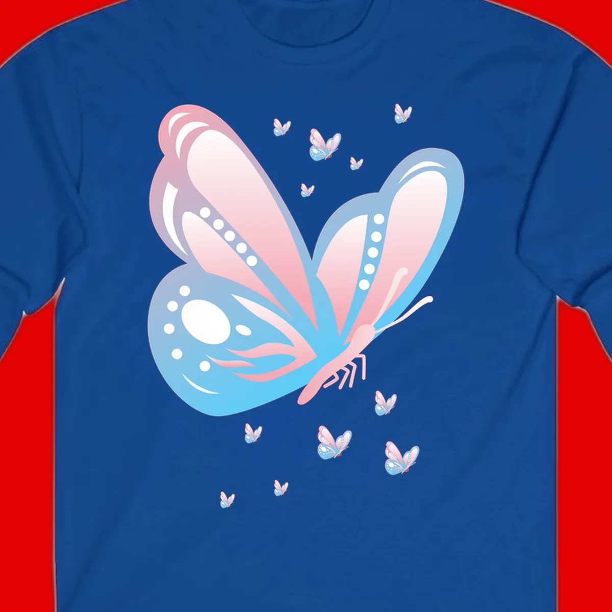 Large butterfly with pink and blue gradient wings featuring white dot details, surrounded by smaller flying butterflies on gray background