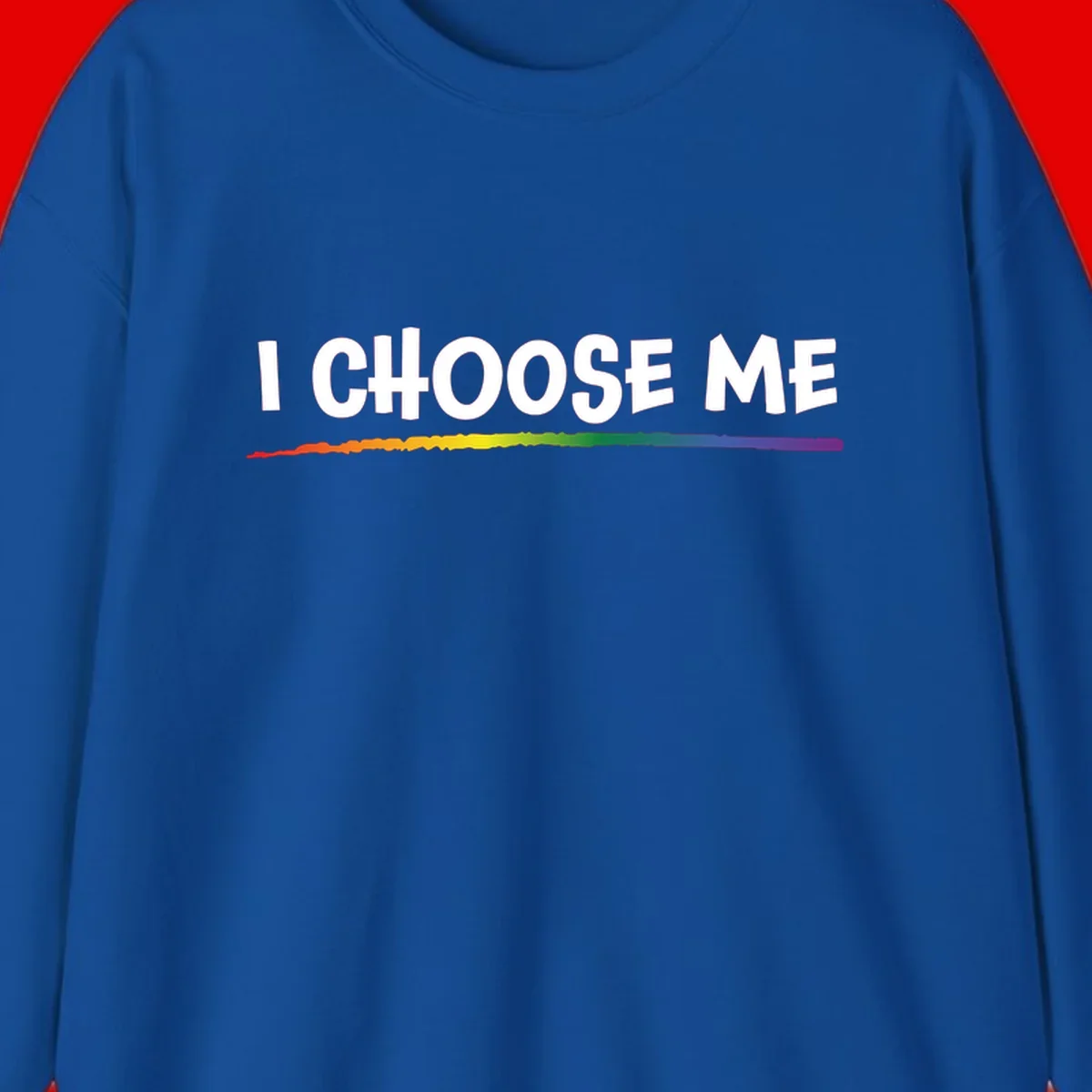 White text 'I Choose Me' above a vibrant rainbow gradient bar with pride flag colors on gray background