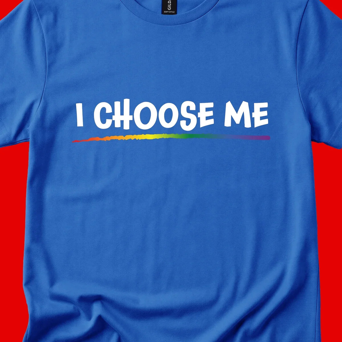 White text 'I Choose Me' above a vibrant rainbow gradient bar with pride flag colors on gray background