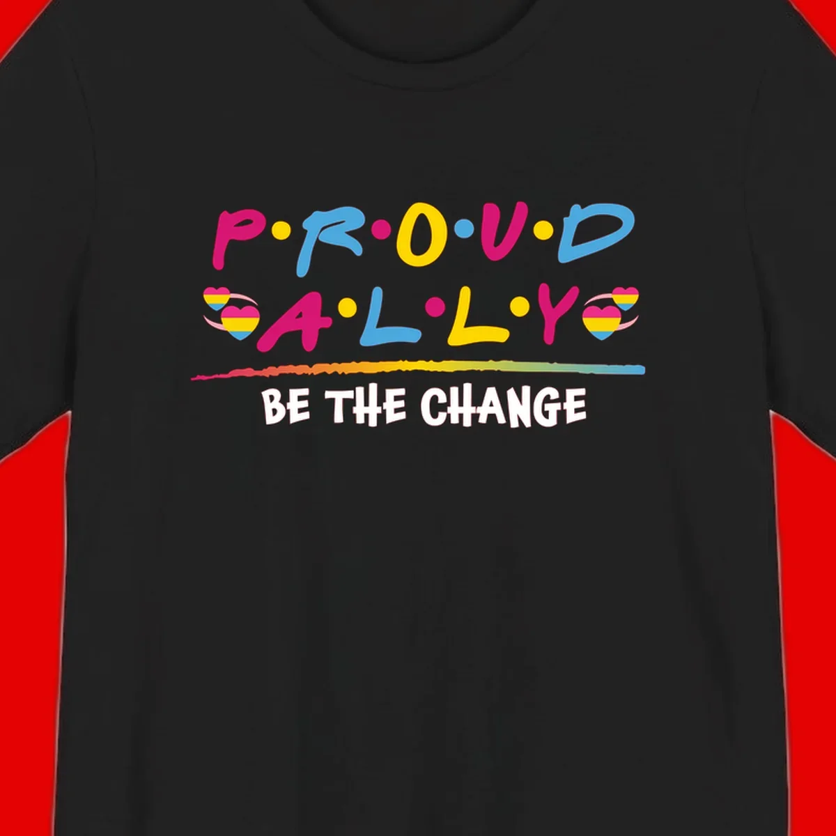 Colorful proud ally pride design with rainbow hearts, bold lettering spelling P.R.O.U.D and A.L.L.Y, and 'BE THE CHANGE' message