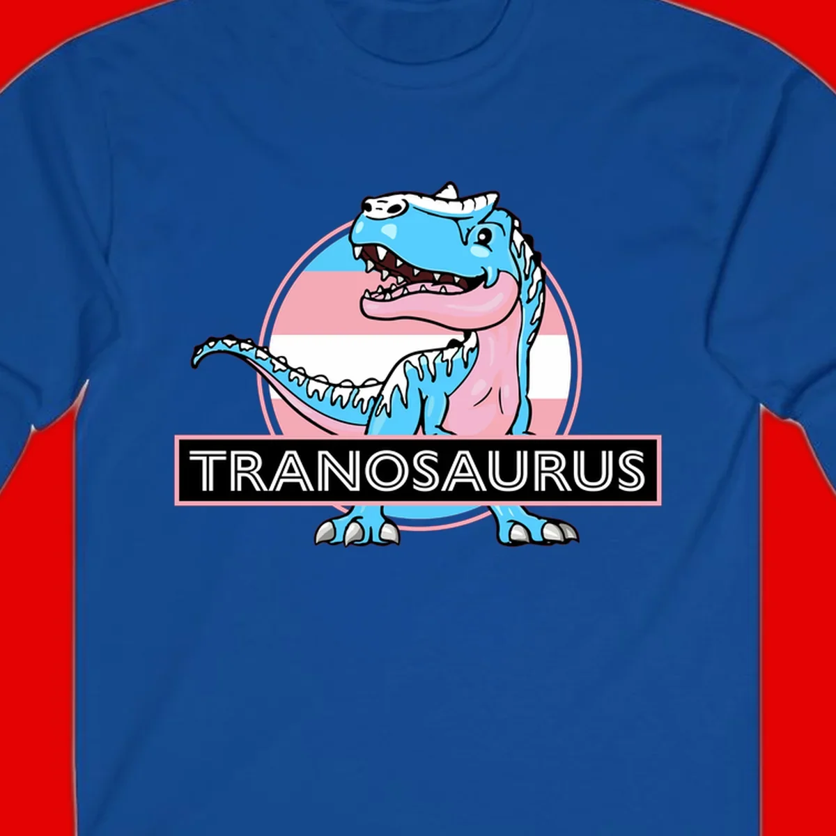 Blue cartoon T-Rex dinosaur with open mouth against pink and white pride flag circular background, labeled Tranosaurus