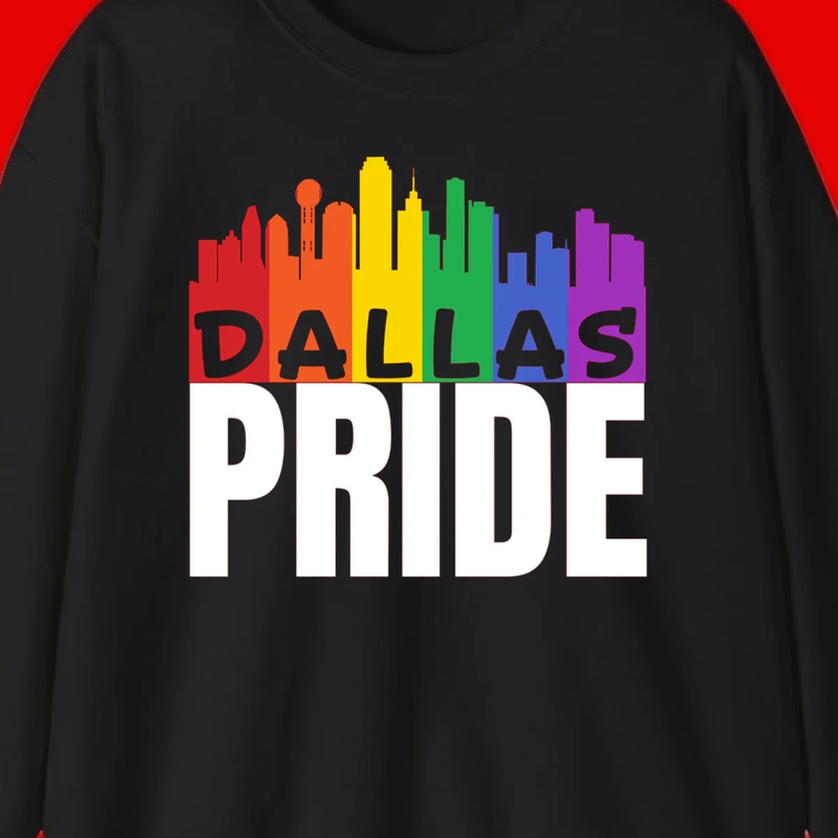 Dallas skyline in rainbow Pride colors with gray 'DALLAS PRIDE' text on white background