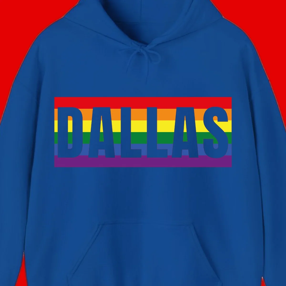 Gray DALLAS text overlaid on rainbow pride flag with red, orange, yellow, green, blue, and purple horizontal stripes