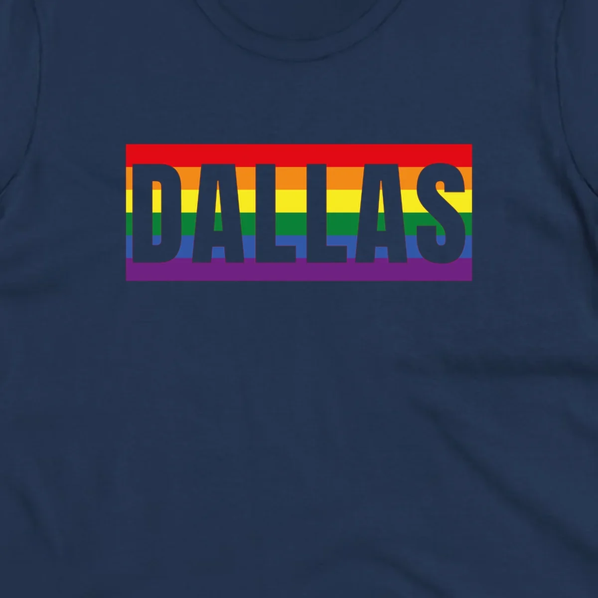 Gray DALLAS text overlaid on rainbow pride flag with red, orange, yellow, green, blue, and purple horizontal stripes