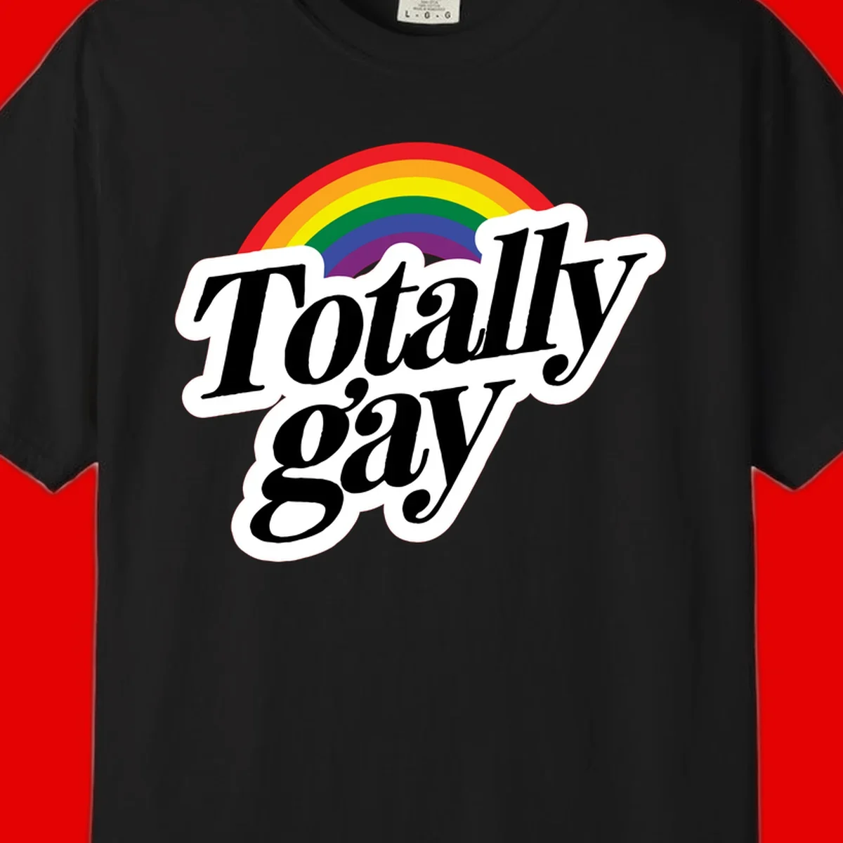 Totally gay pride design with rainbow arc and bold black text on white banner celebrating LGBTQ identity