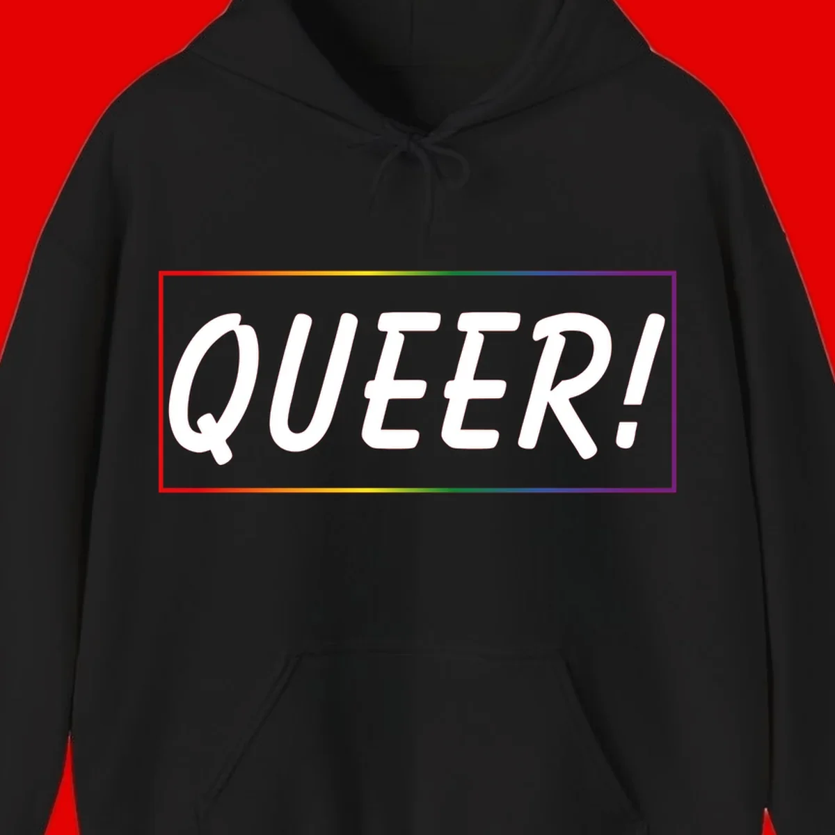 White bold text reading 'QUEER!' on gray background with rainbow gradient border representing pride colors
