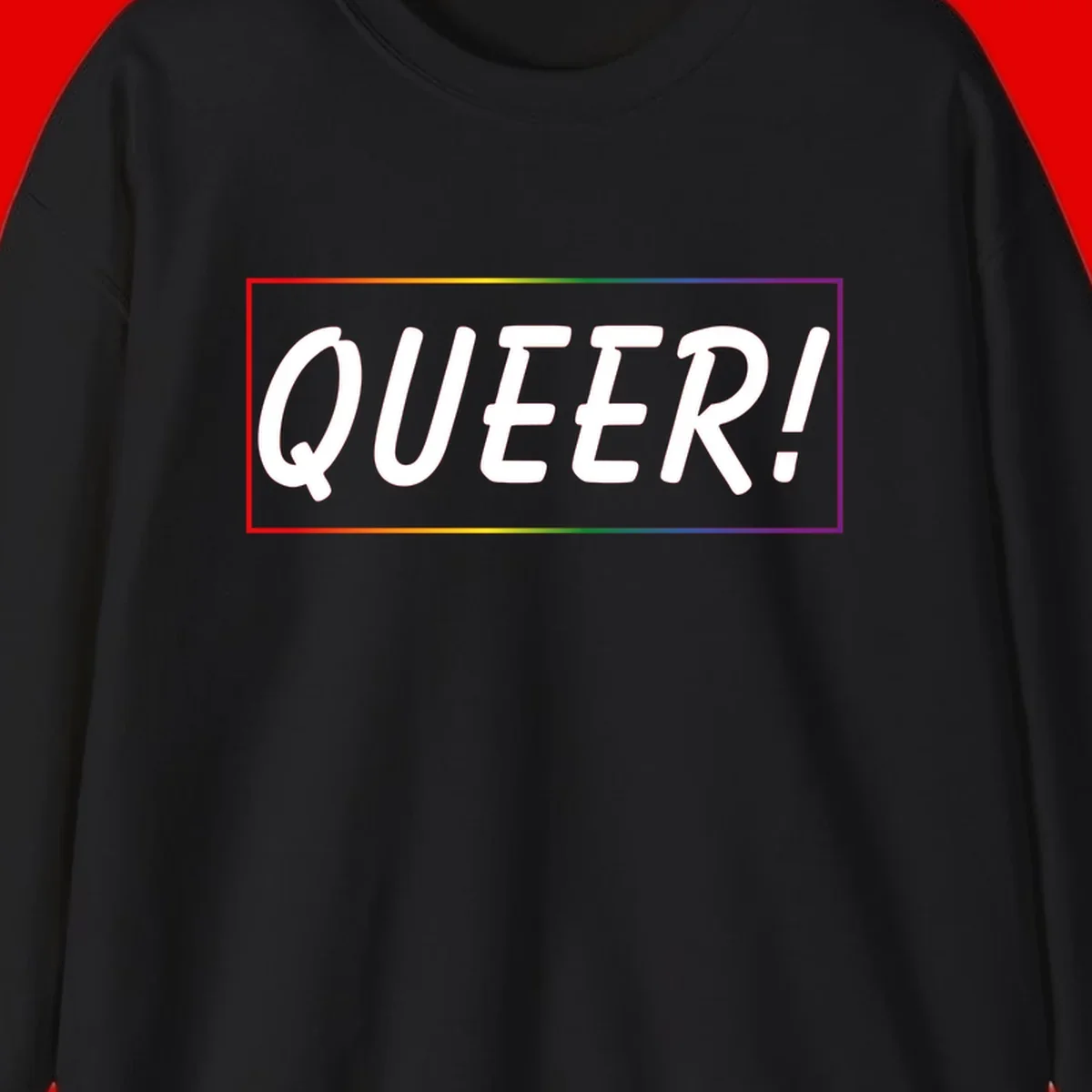 White bold text reading 'QUEER!' on gray background with rainbow gradient border representing pride colors