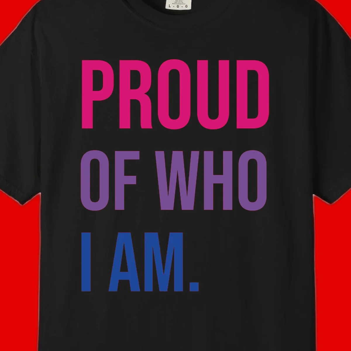Bold colorful typography design reading 'PROUD OF WHO I AM' in magenta, purple, and blue letters on gray background
