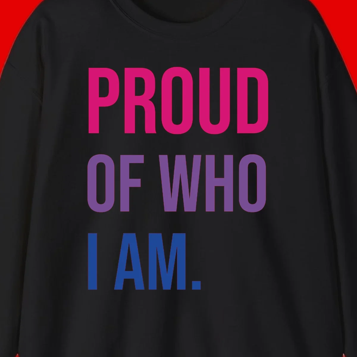 Bold colorful typography design reading 'PROUD OF WHO I AM' in magenta, purple, and blue letters on gray background