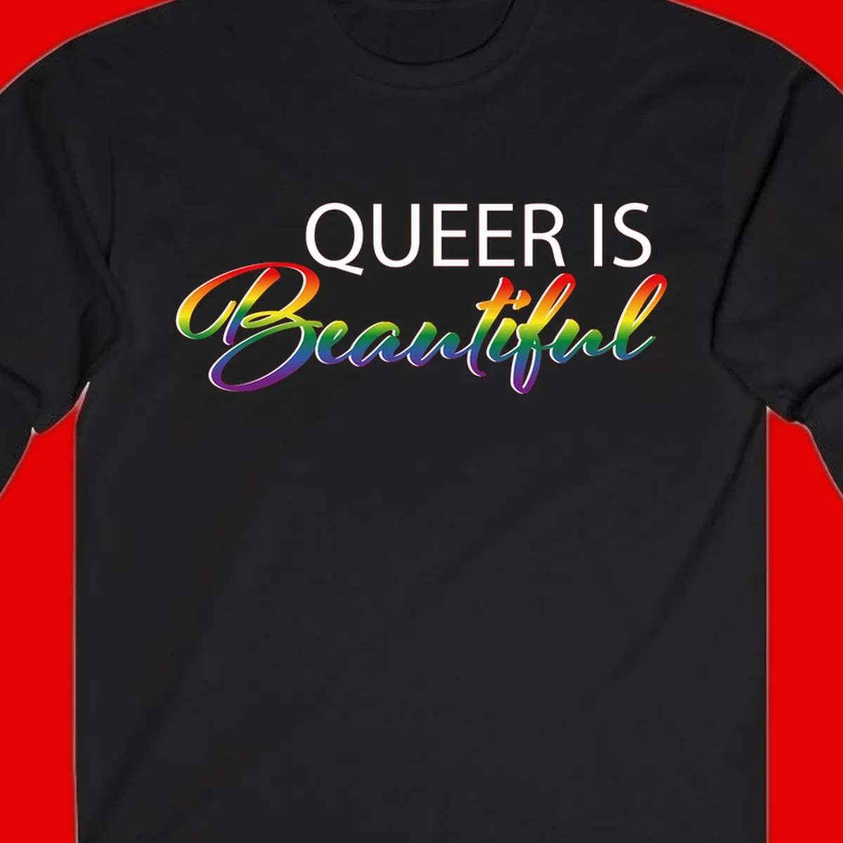 Rainbow gradient text reading 'Queer Is Beautiful' in pride flag colors on gray background