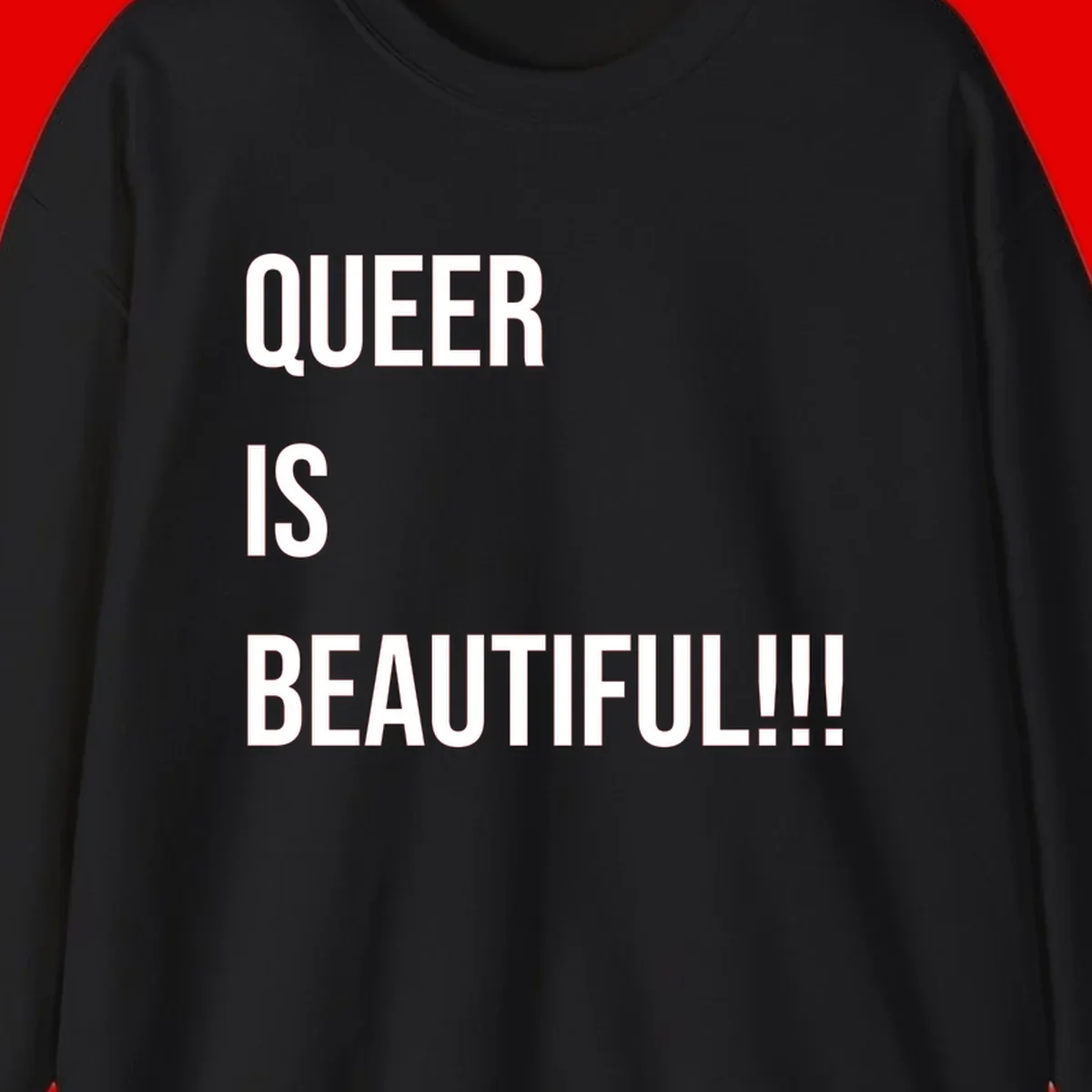 Bold white typography reading 'QUEER IS BEAUTIFUL!!!' on gray background, pride affirmation design
