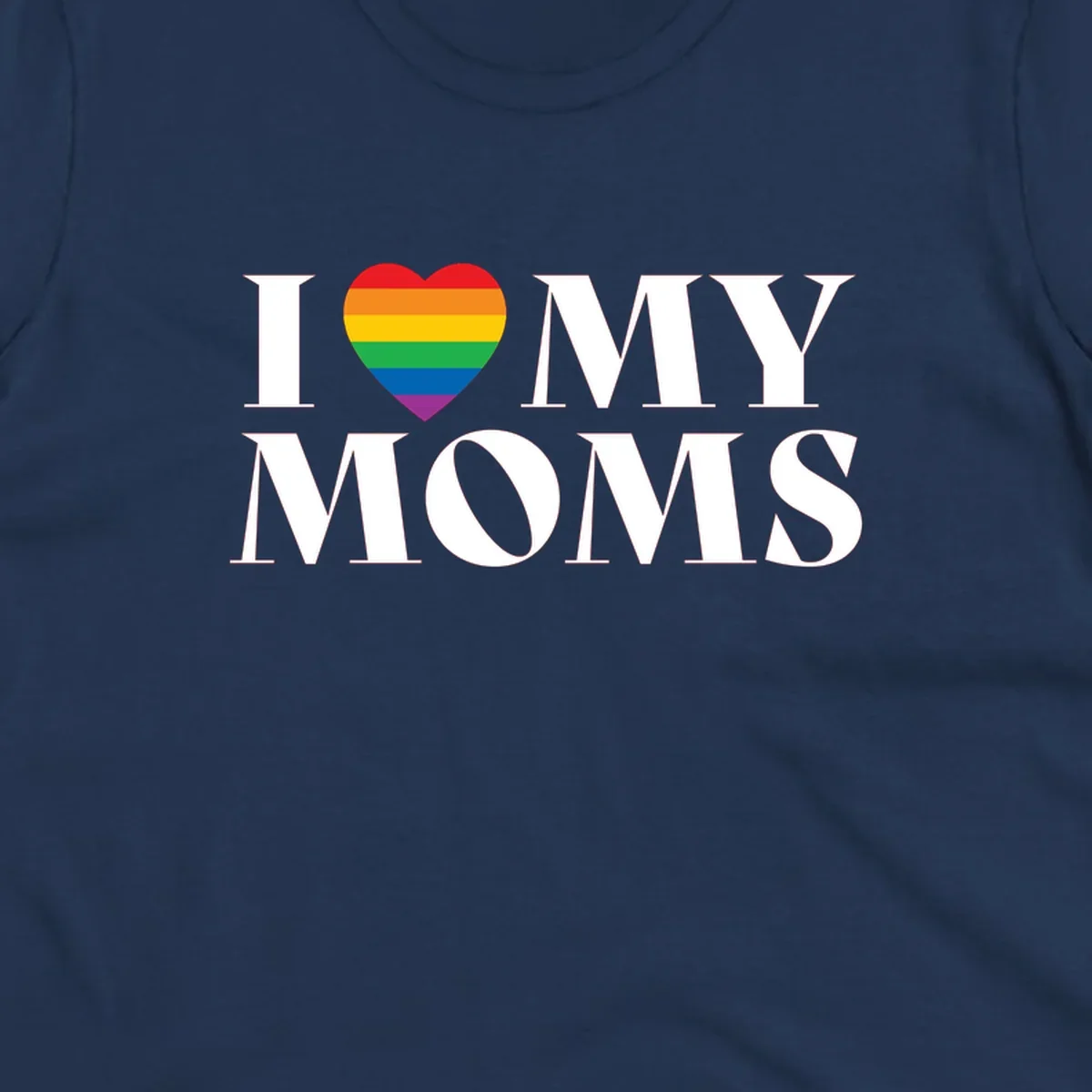 White text reading 'I love my moms' with a rainbow-striped heart symbol, celebrating LGBTQ+ family pride