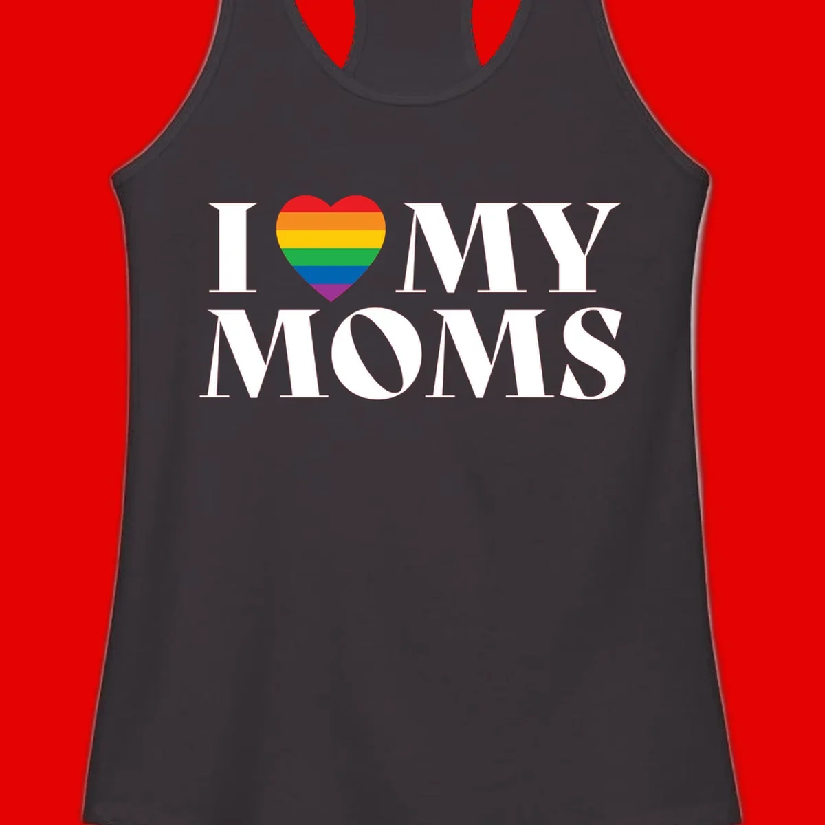 White text reading 'I love my moms' with a rainbow-striped heart symbol, celebrating LGBTQ+ family pride