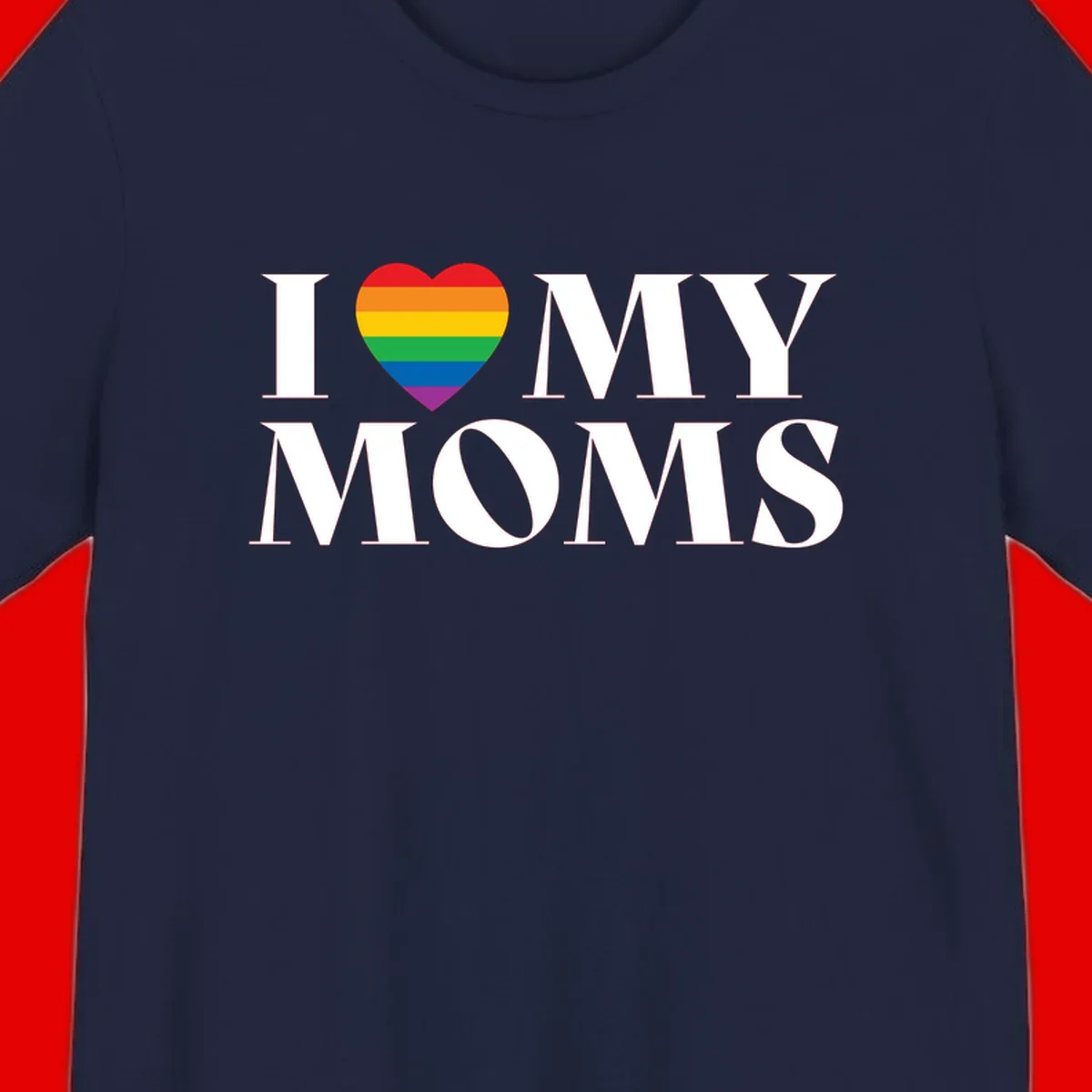 White text reading 'I love my moms' with a rainbow-striped heart symbol, celebrating LGBTQ+ family pride