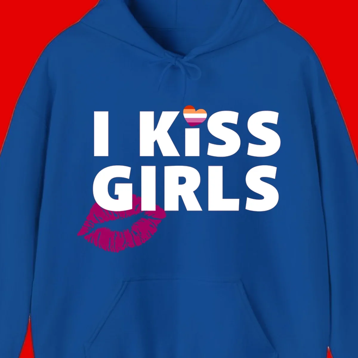 I Kiss Girls pride design with magenta lip print, rainbow heart, and bold white lettering celebrating lesbian identity