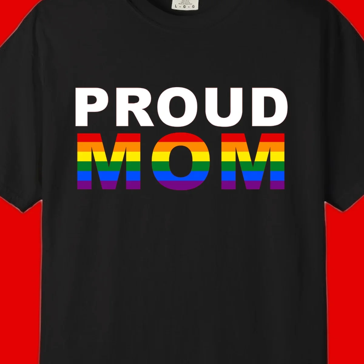 Proud Mom Pride design with rainbow flag-colored letters spelling PROUD MOM against gray background