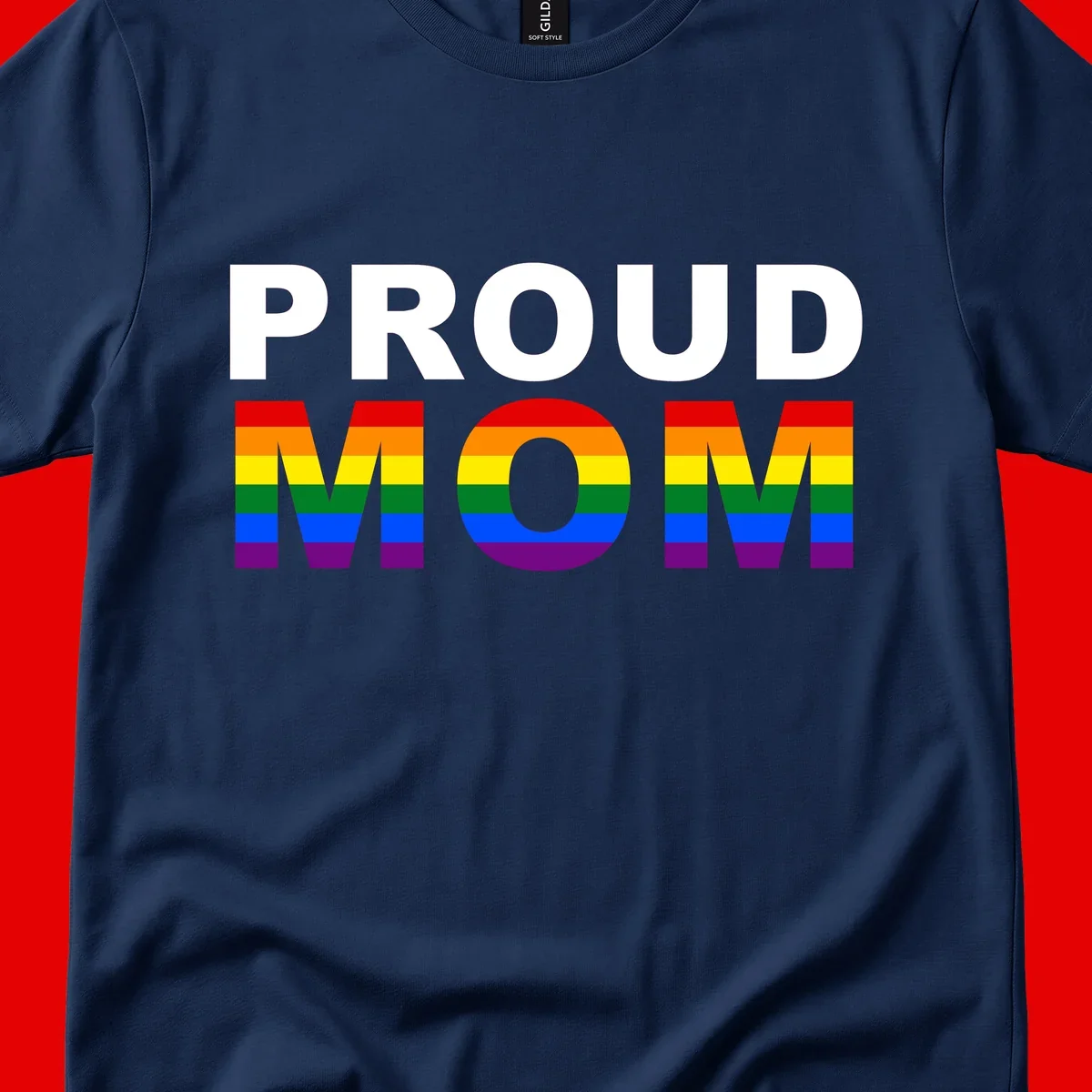 Proud Mom Pride design with rainbow flag-colored letters spelling PROUD MOM against gray background