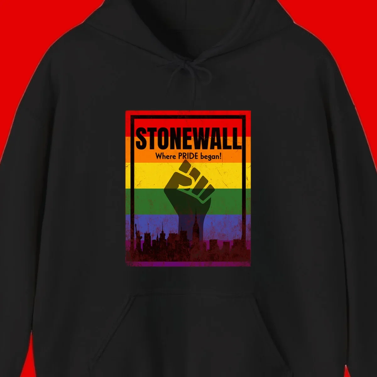 Stonewall pride history design: raised fist against rainbow flag with NYC skyline and 'Where Pride began' text