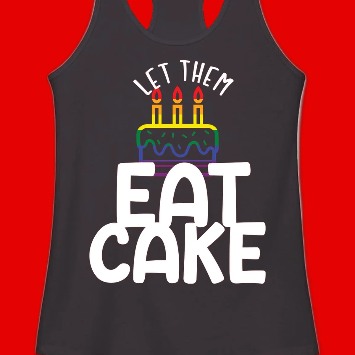 Rainbow-layered birthday cake with three candles above bold white text reading 'Let Them Eat Cake' - a Pride-themed design