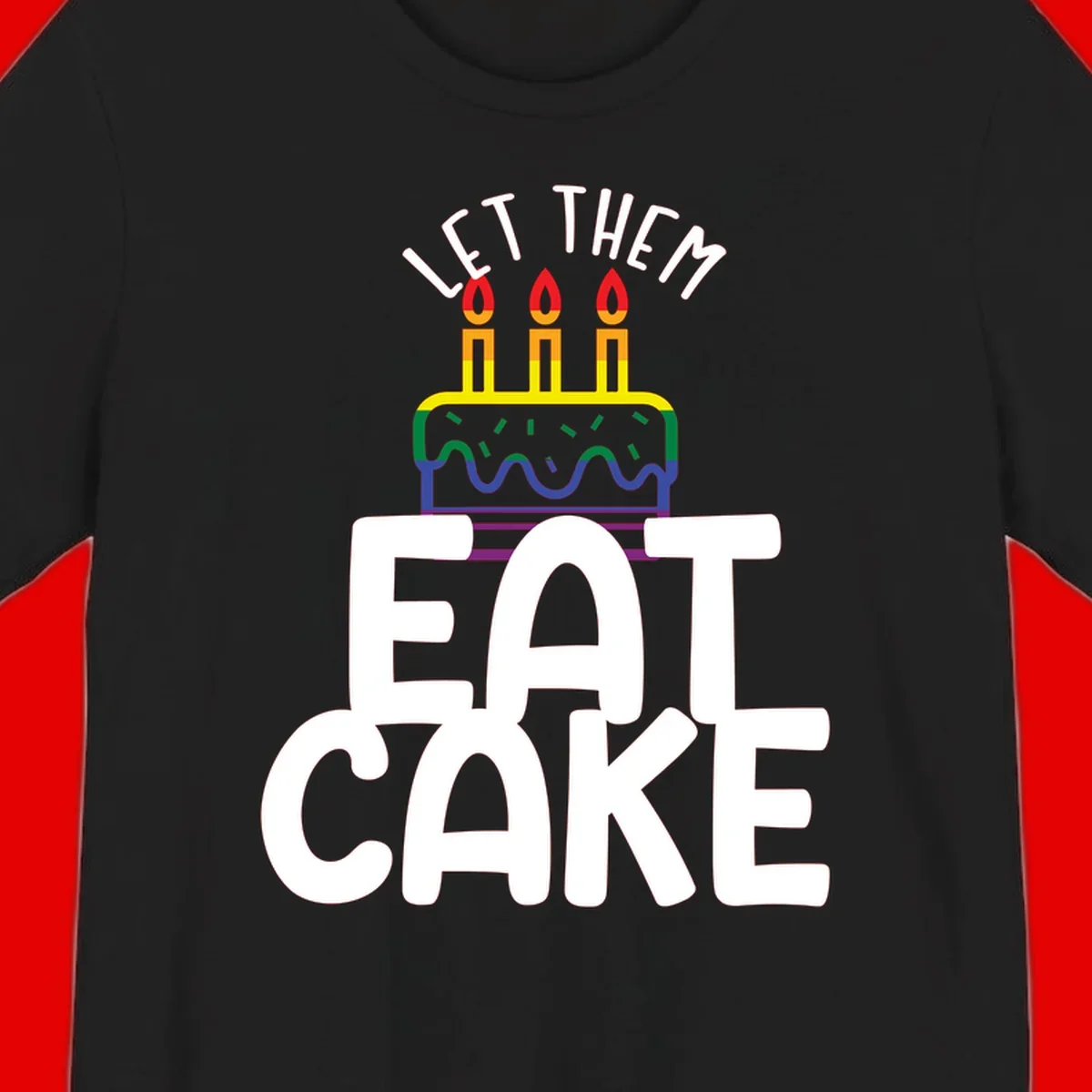Rainbow-layered birthday cake with three candles above bold white text reading 'Let Them Eat Cake' - a Pride-themed design