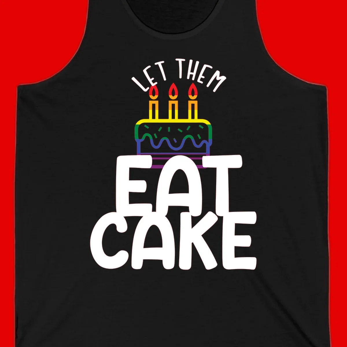 Rainbow-layered birthday cake with three candles above bold white text reading 'Let Them Eat Cake' - a Pride-themed design