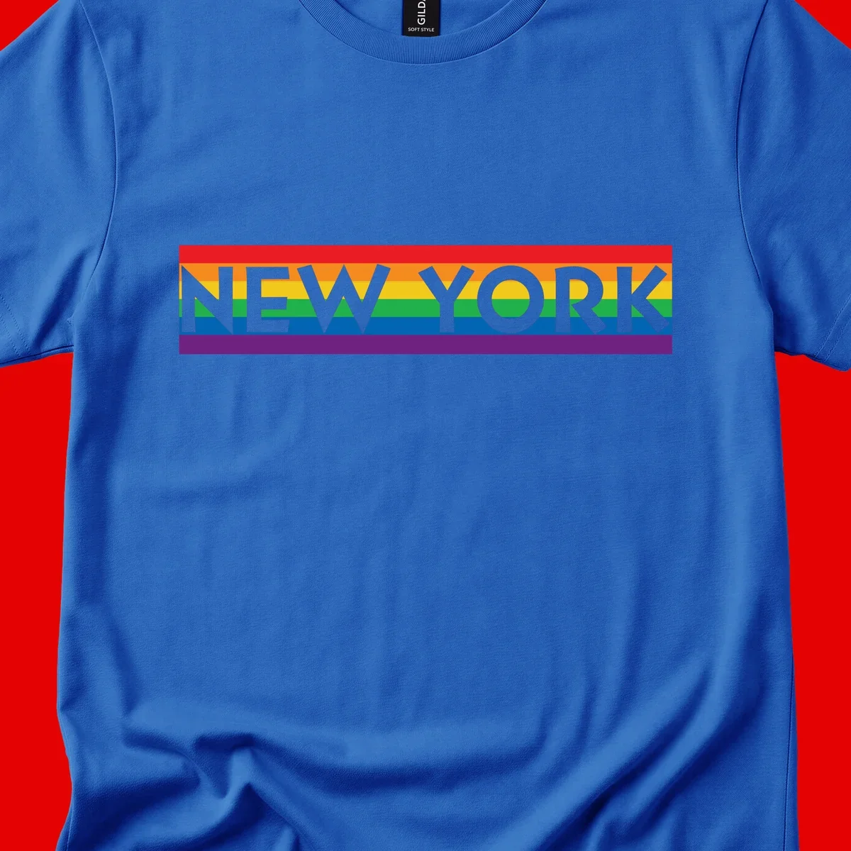 New York pride rainbow design with gray text over six-color pride flag stripes in red, orange, yellow, green, blue, and purple