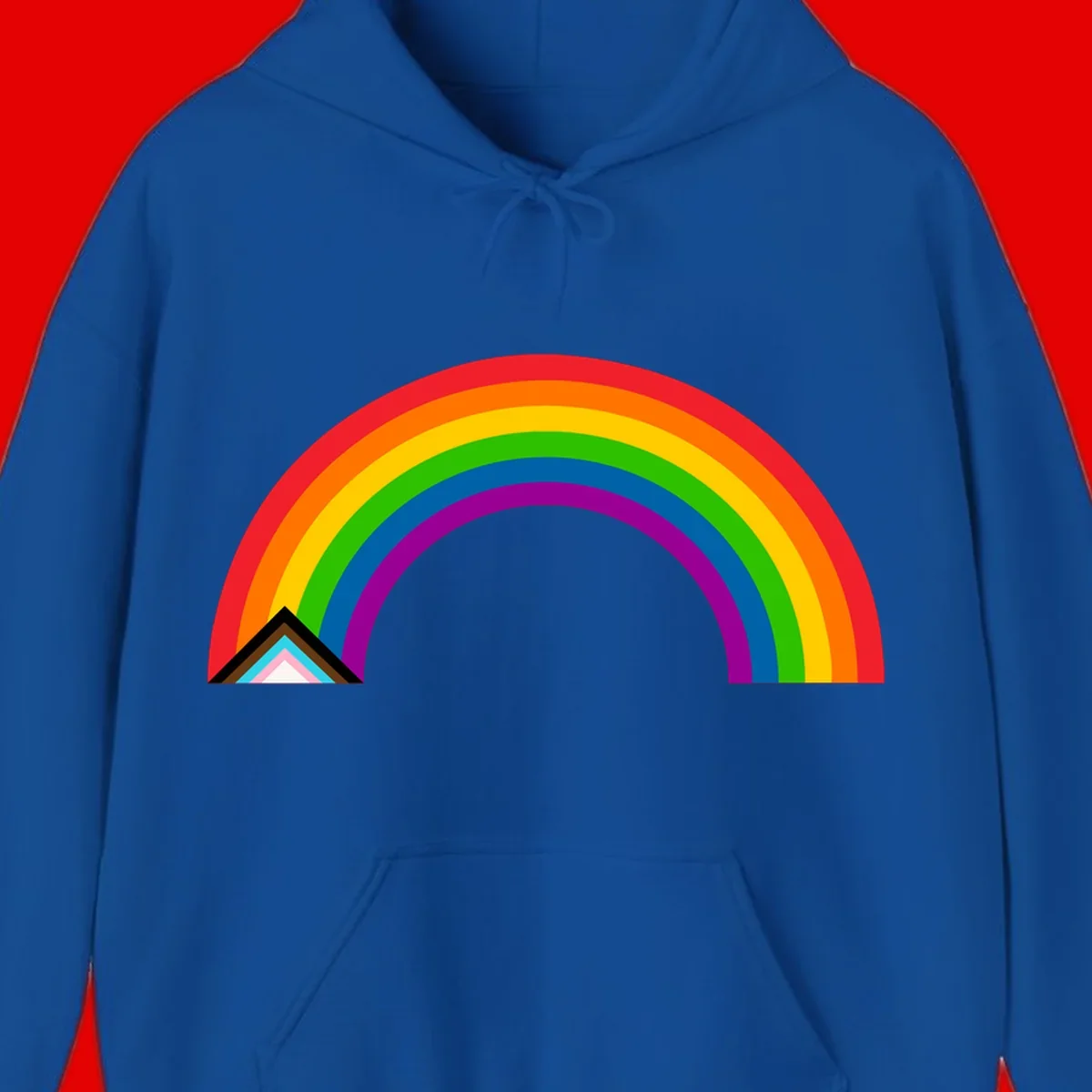 Vibrant rainbow pride arc with concentric color bands and geometric base shapes on gray background