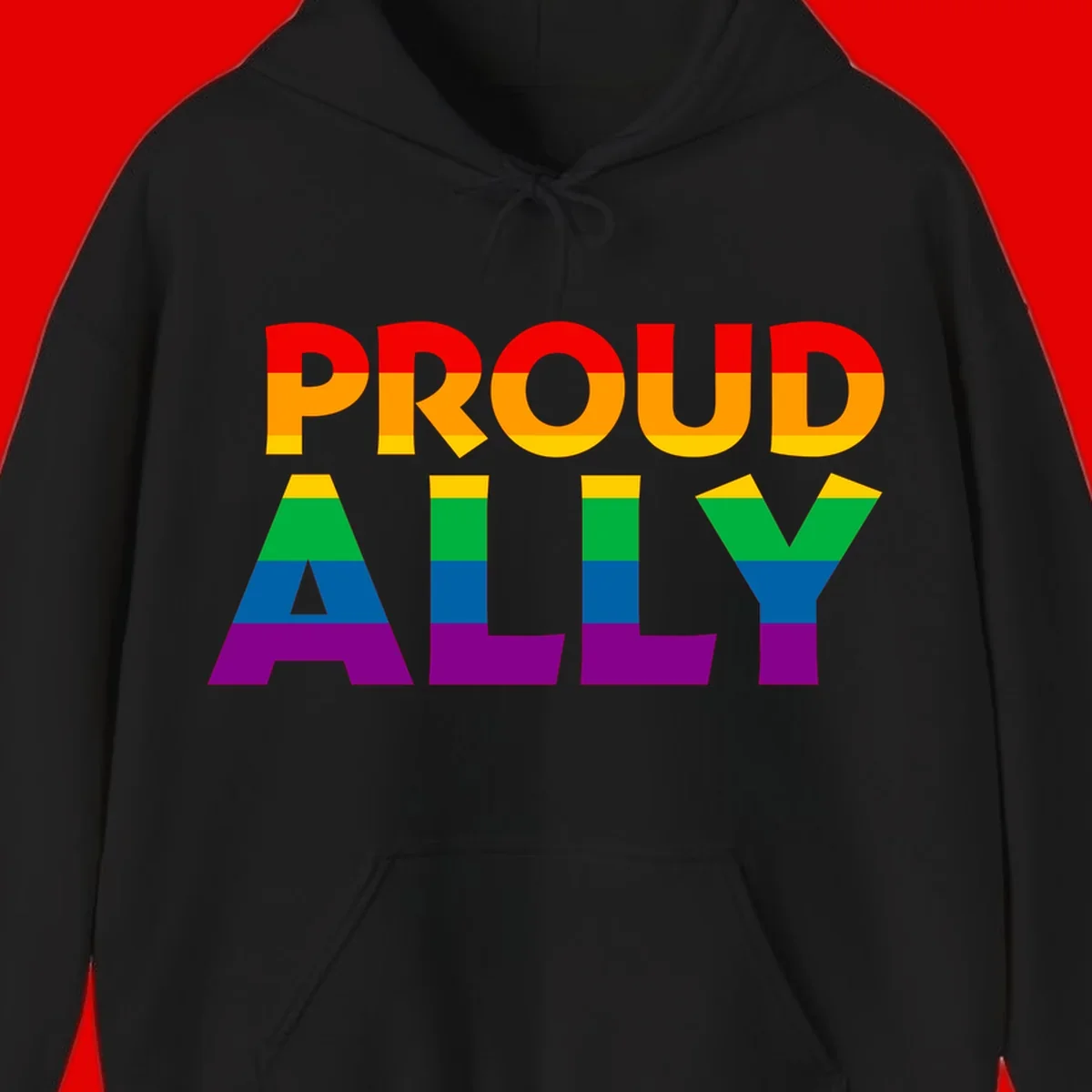 Proud Ally design with rainbow-striped letters in pride flag colors on gray background