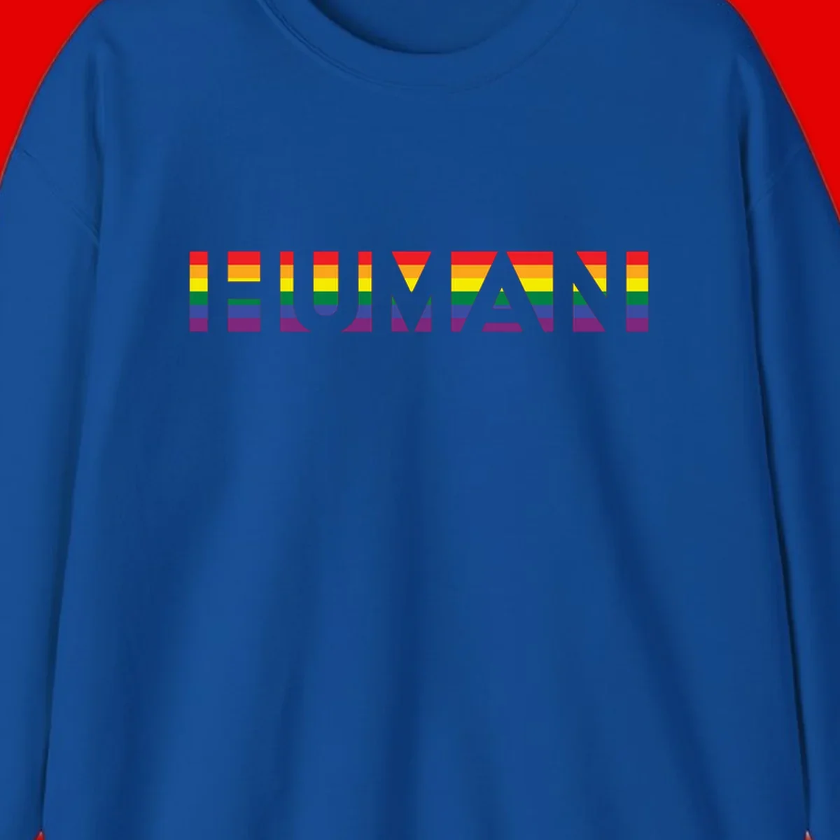 Rainbow pride letters in red, orange, yellow, green, blue, and purple stripes on gray background