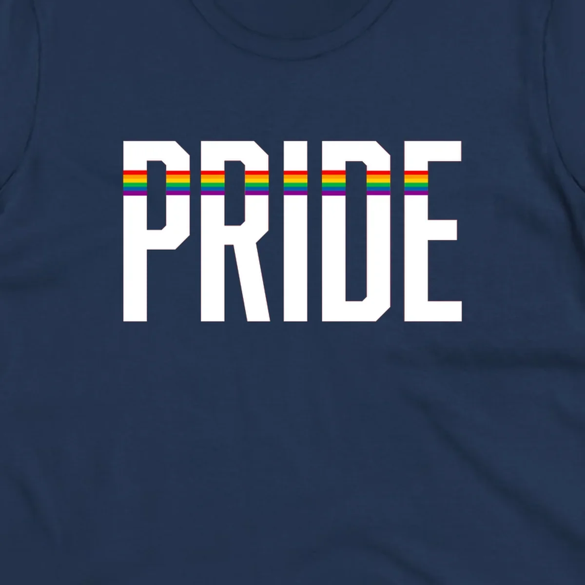 The word PRIDE in large 3D gray block letters with horizontal rainbow pride flag stripes running through the center of each letter against a white background.