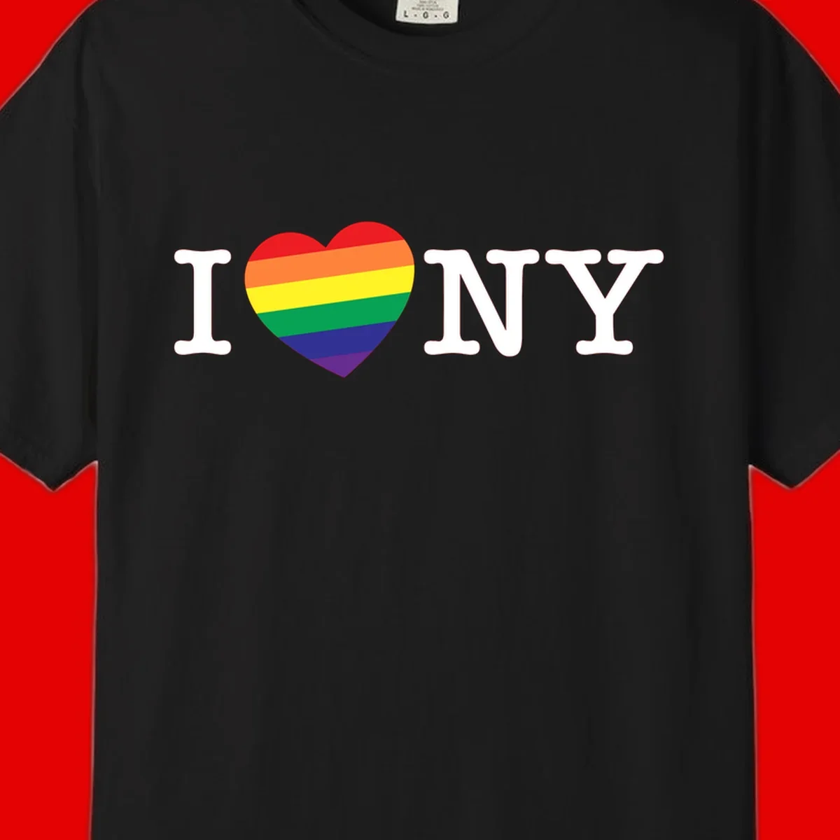 I Love New York Pride design with rainbow heart replacing the love symbol, featuring pride flag colors on gray background