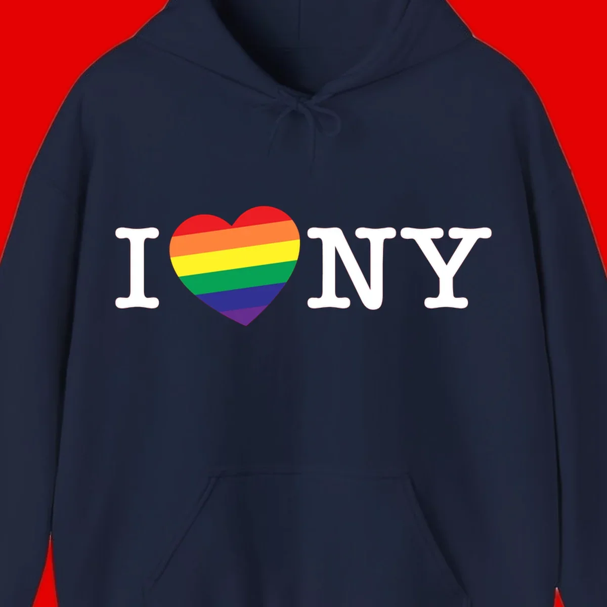 I Love New York Pride design with rainbow heart replacing the love symbol, featuring pride flag colors on gray background