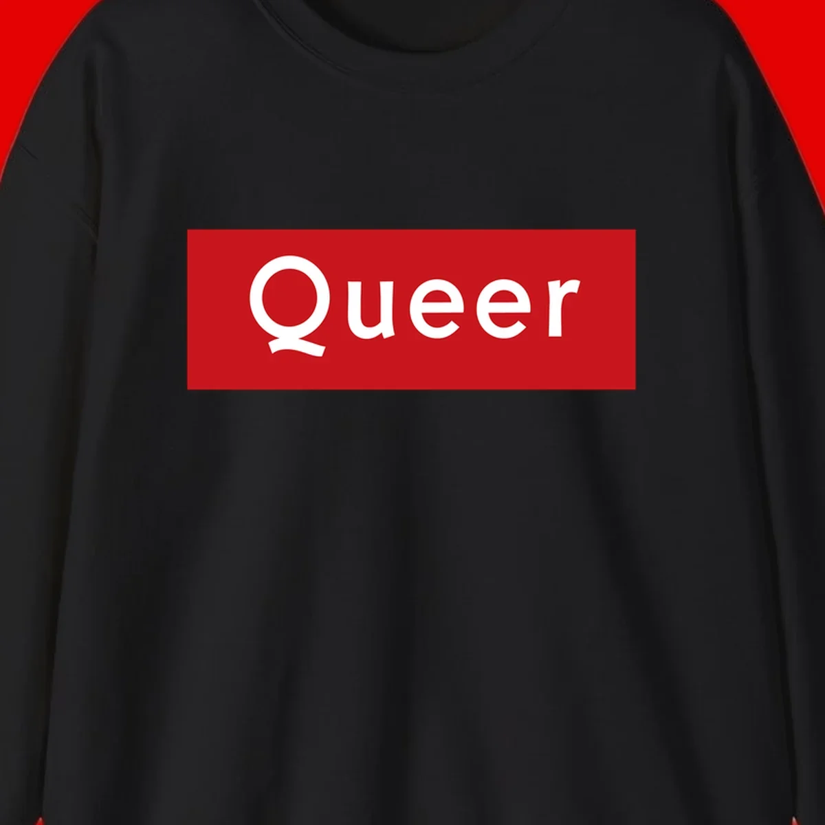 Bold white 'Queer' text on bright red background - a powerful queer pride statement design