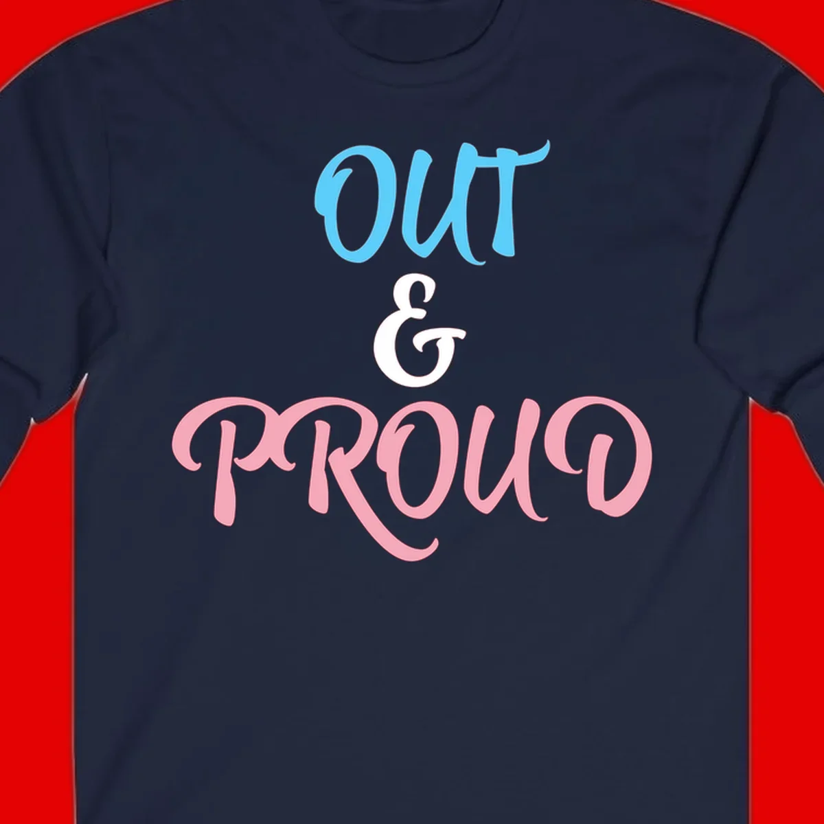 Out and proud pride design with blue 'OUT' text, white ampersand, and pink 'PROUD' lettering on gray background