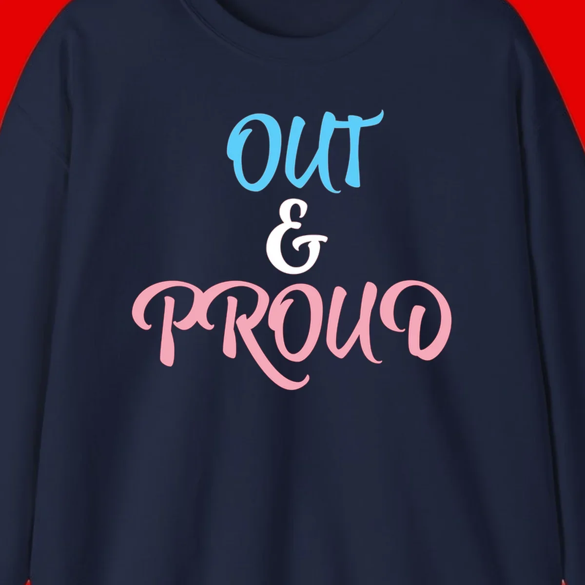 Out and proud pride design with blue 'OUT' text, white ampersand, and pink 'PROUD' lettering on gray background