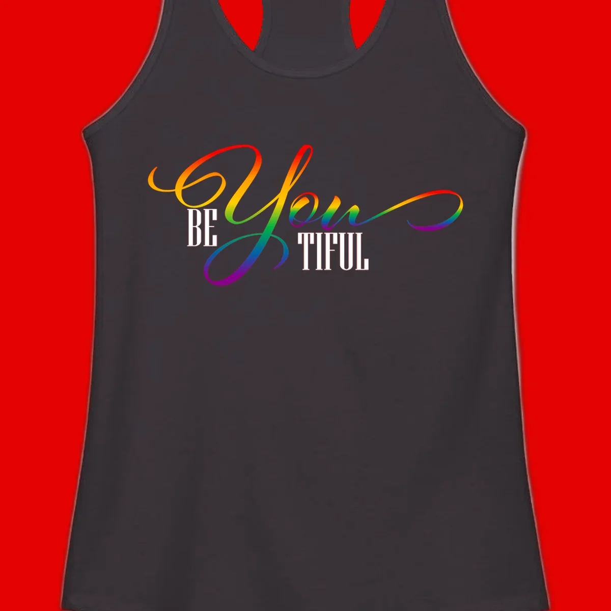Colorful be-you-them-pride design with flowing rainbow gradient text transitioning from red to purple on gray background