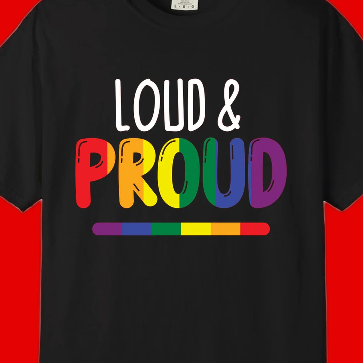 Loud and proud rainbow pride design with colorful gradient letters and pride flag stripe on gray background