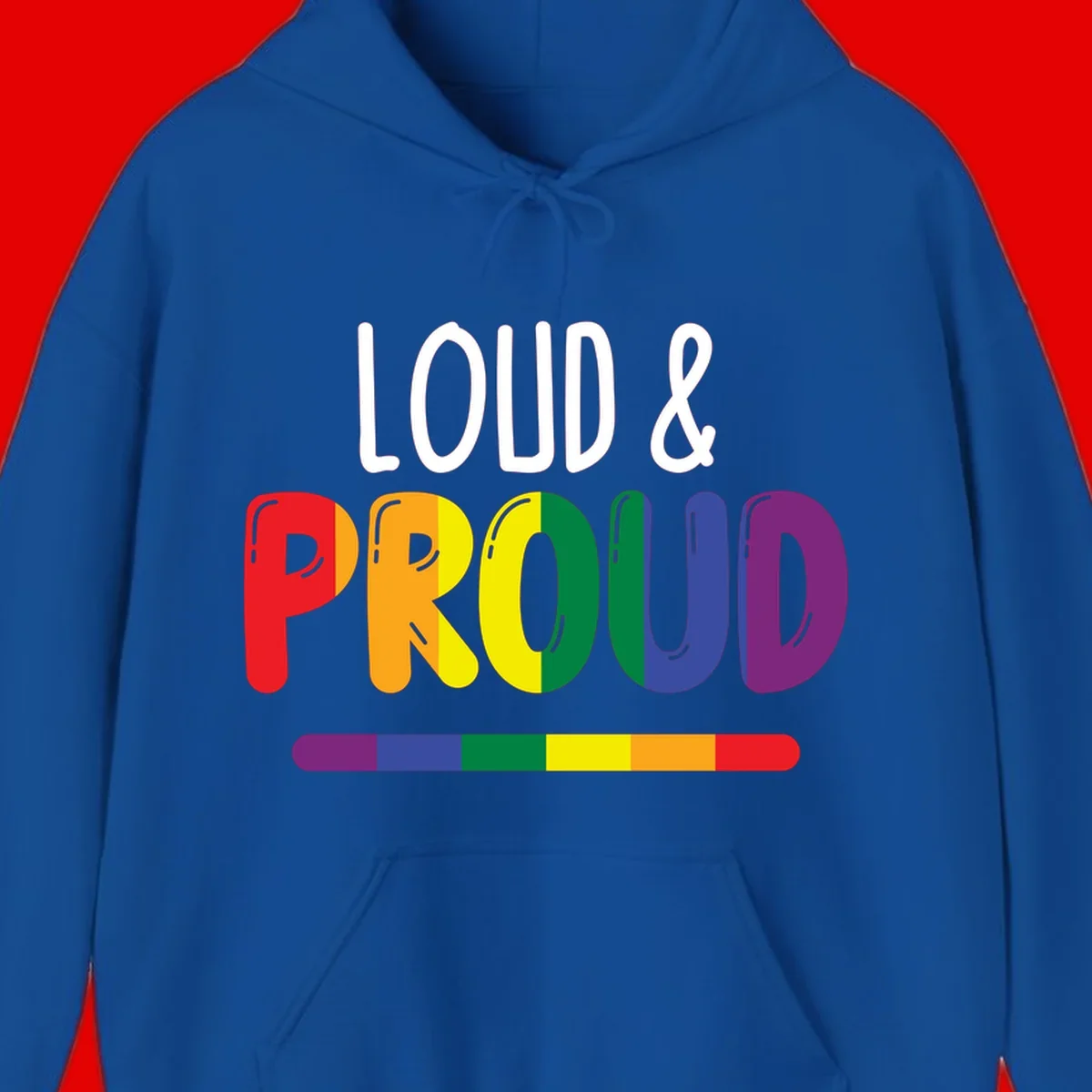Loud and proud rainbow pride design with colorful gradient letters and pride flag stripe on gray background
