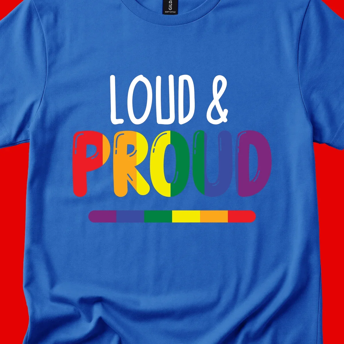 Loud and proud rainbow pride design with colorful gradient letters and pride flag stripe on gray background