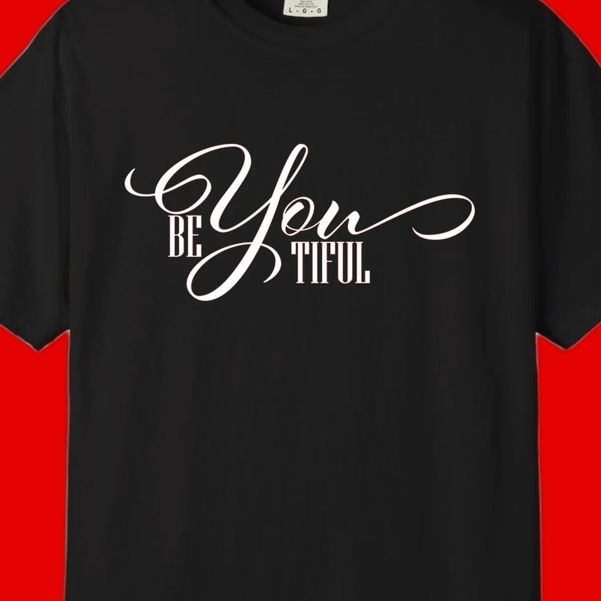 Elegant white typography reading 'BE YOU THRILL' with decorative script and serif lettering on gray background
