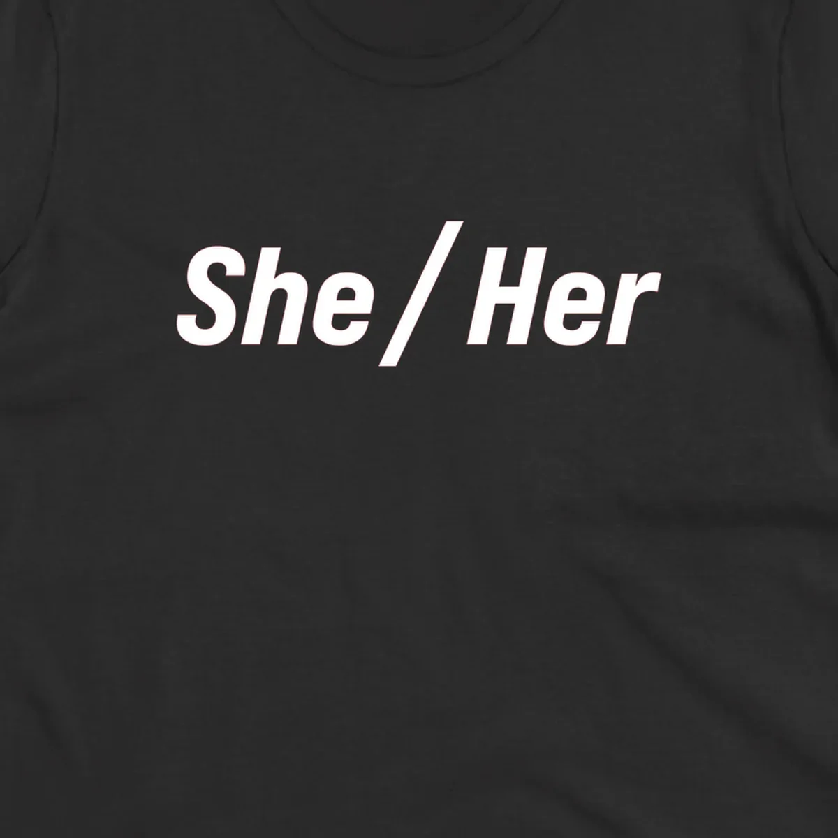White text reading 'She / Her' in bold sans-serif font on gray background, pronoun statement design