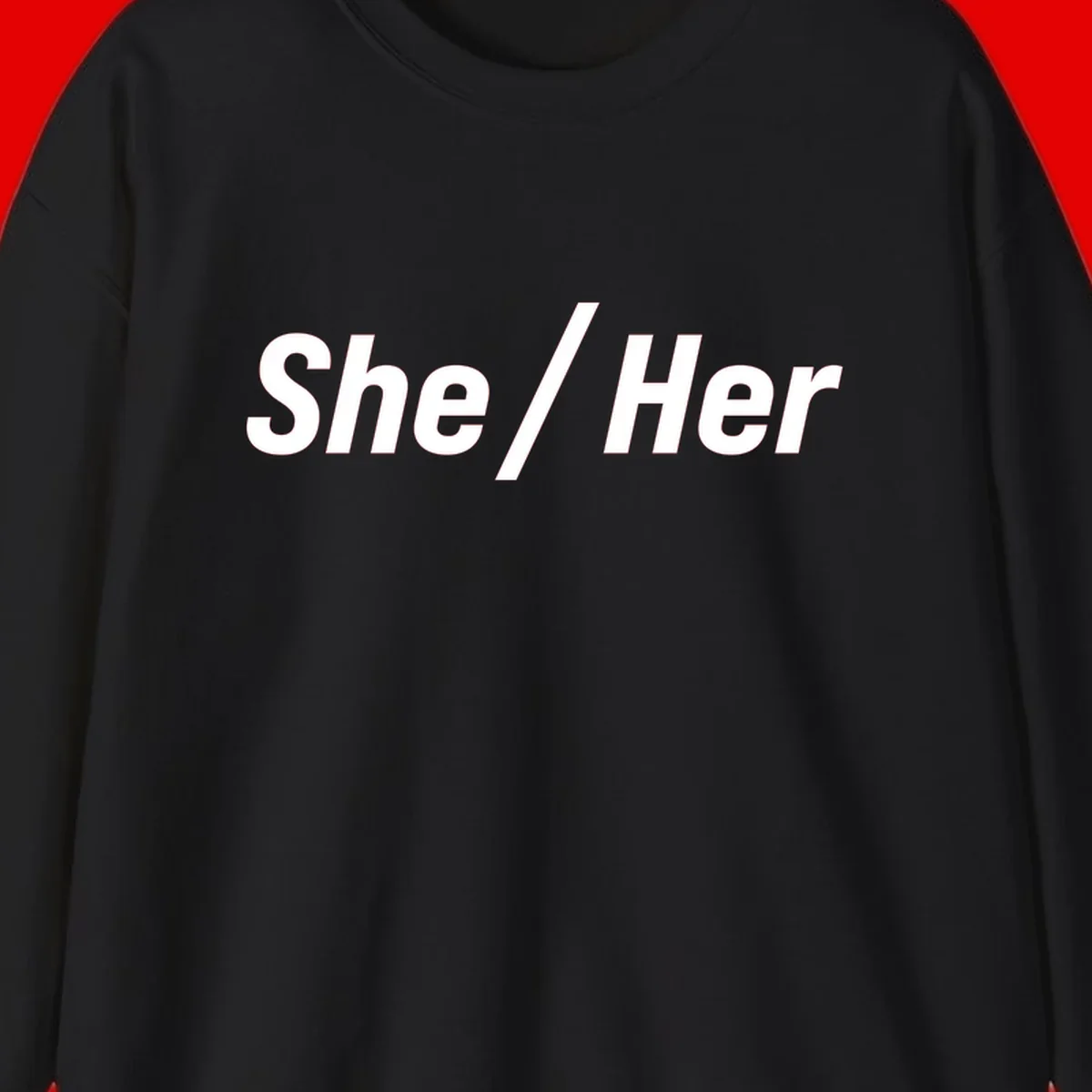 White text reading 'She / Her' in bold sans-serif font on gray background, pronoun statement design