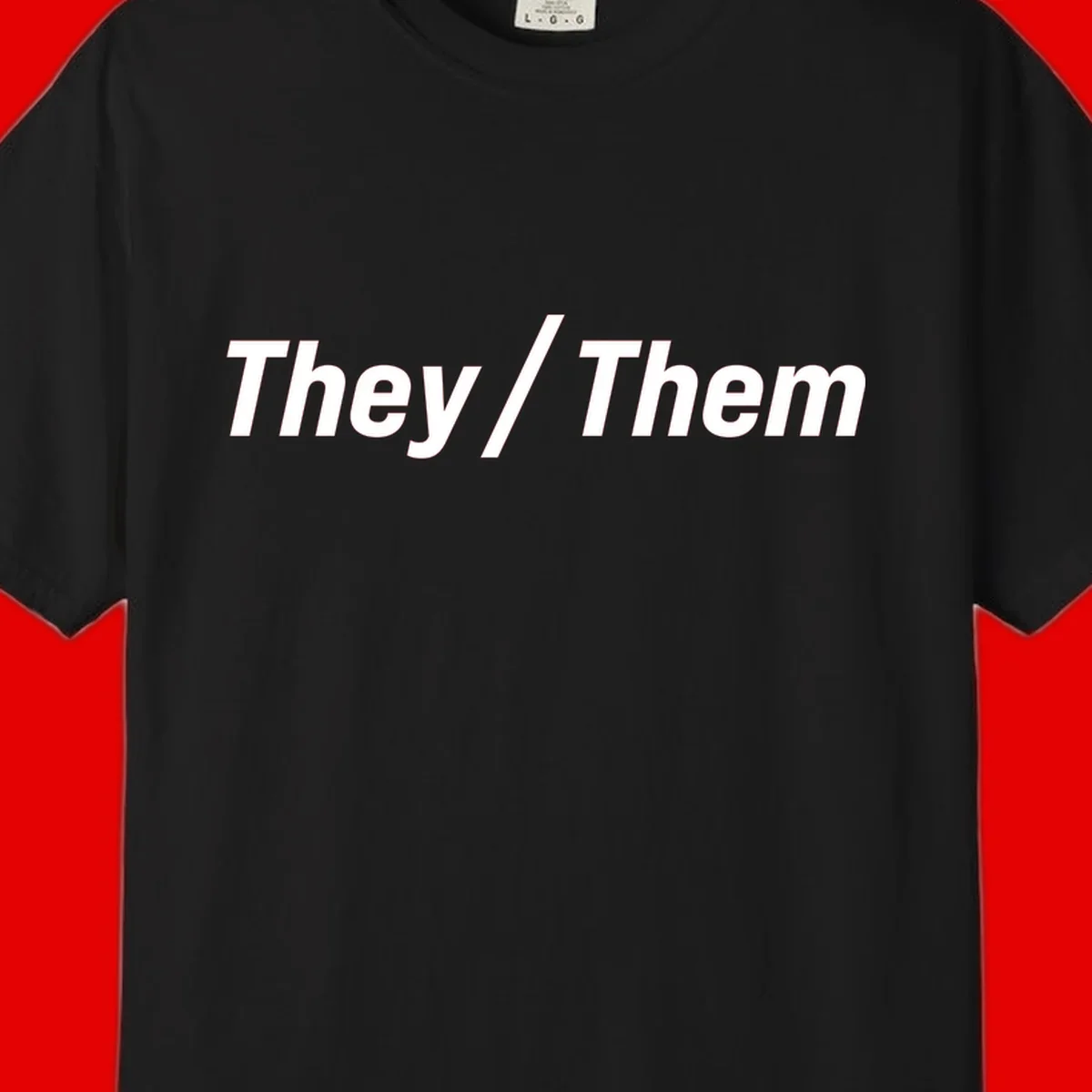 Bold white text reading 'They / Them' on gray background, a minimalist pronoun statement design