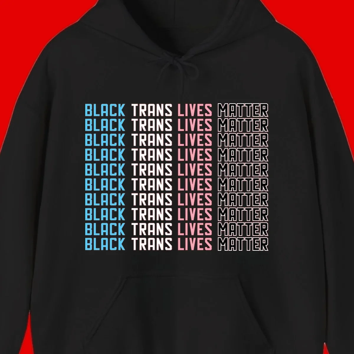 Black trans lives matter repeating text pattern in blue, white, pink and black on gray background
