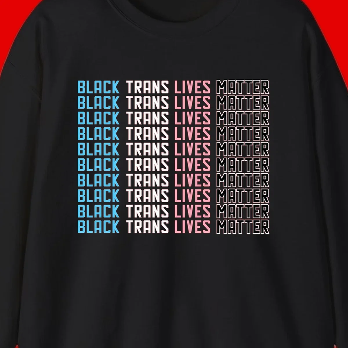 Black trans lives matter repeating text pattern in blue, white, pink and black on gray background