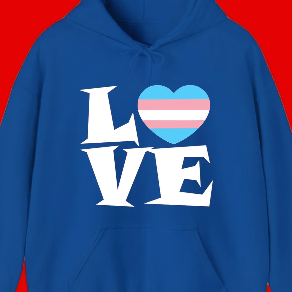 Trans pride heart with cyan, pink, and white stripes next to bold 'Love Wins' text on gray background